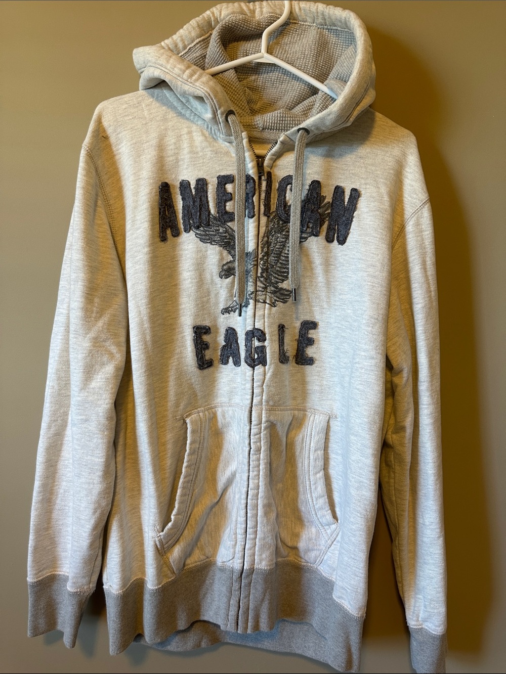 American Eagle Outfitters Light Gray Zip-Up Hoodie with Eagle Logo